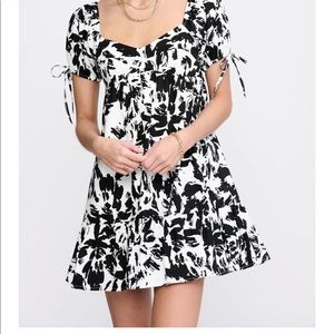 Black and white patterned baby doll dress